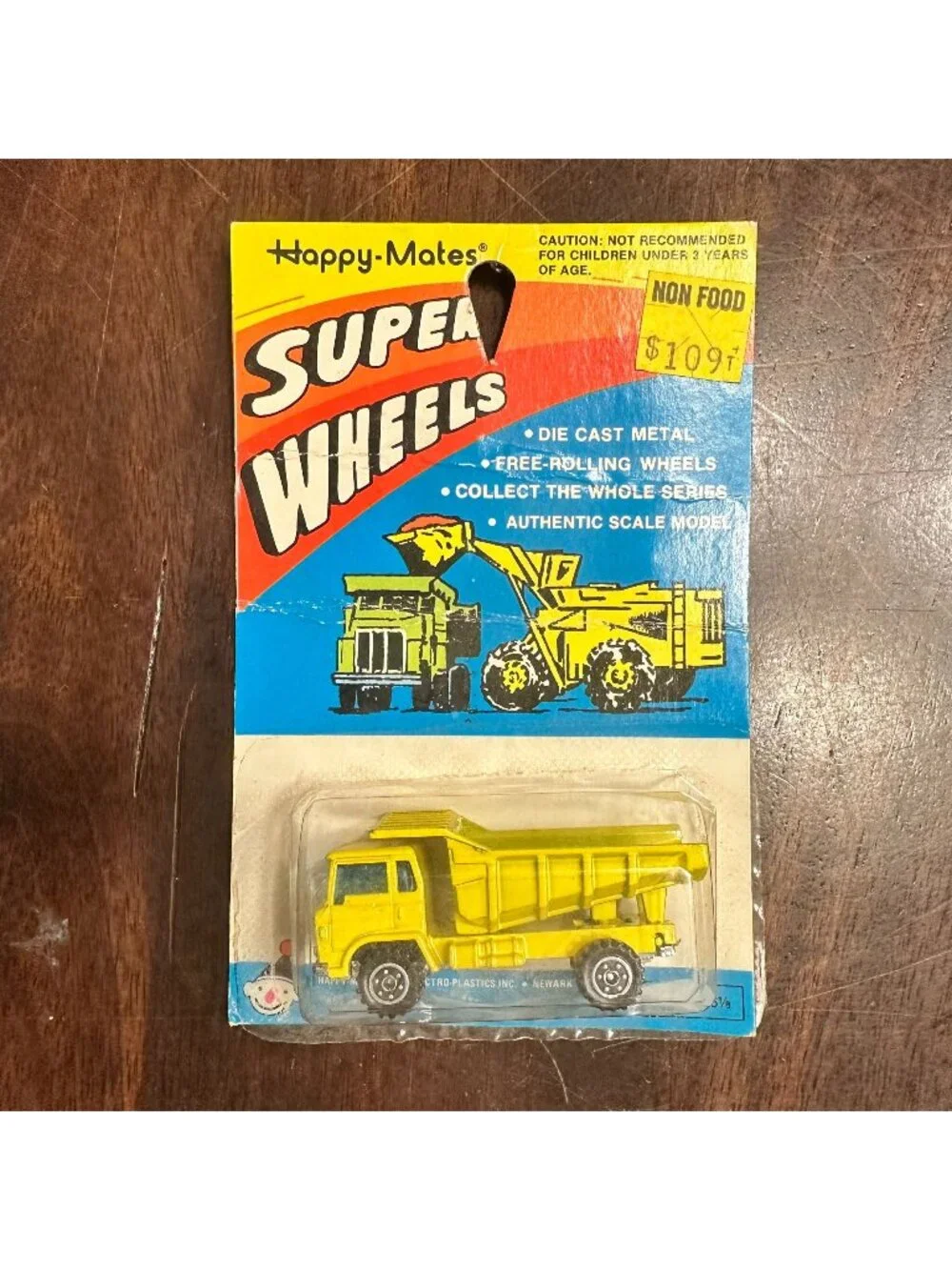Vintage Yellow Die-Cast Dump Truck Toy By Happy Mates Super Wheels